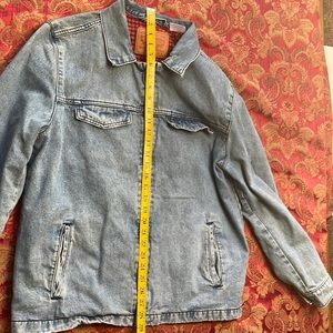 Levi Strauss & Co. denim trucker/rancher size large jacket lightly distressed.
